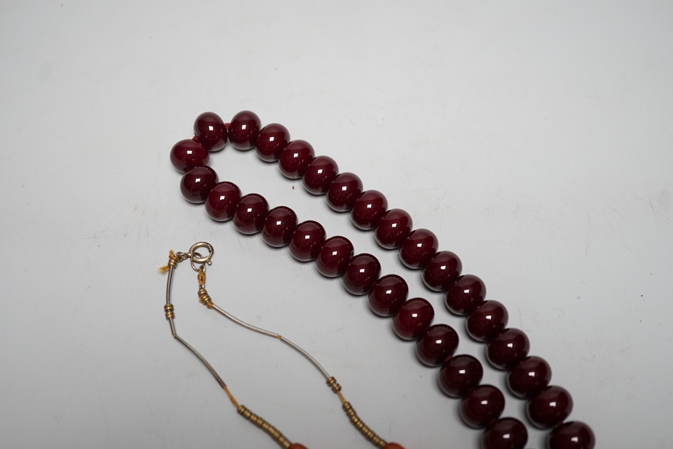A Chinese amber and cherry amber type necklace